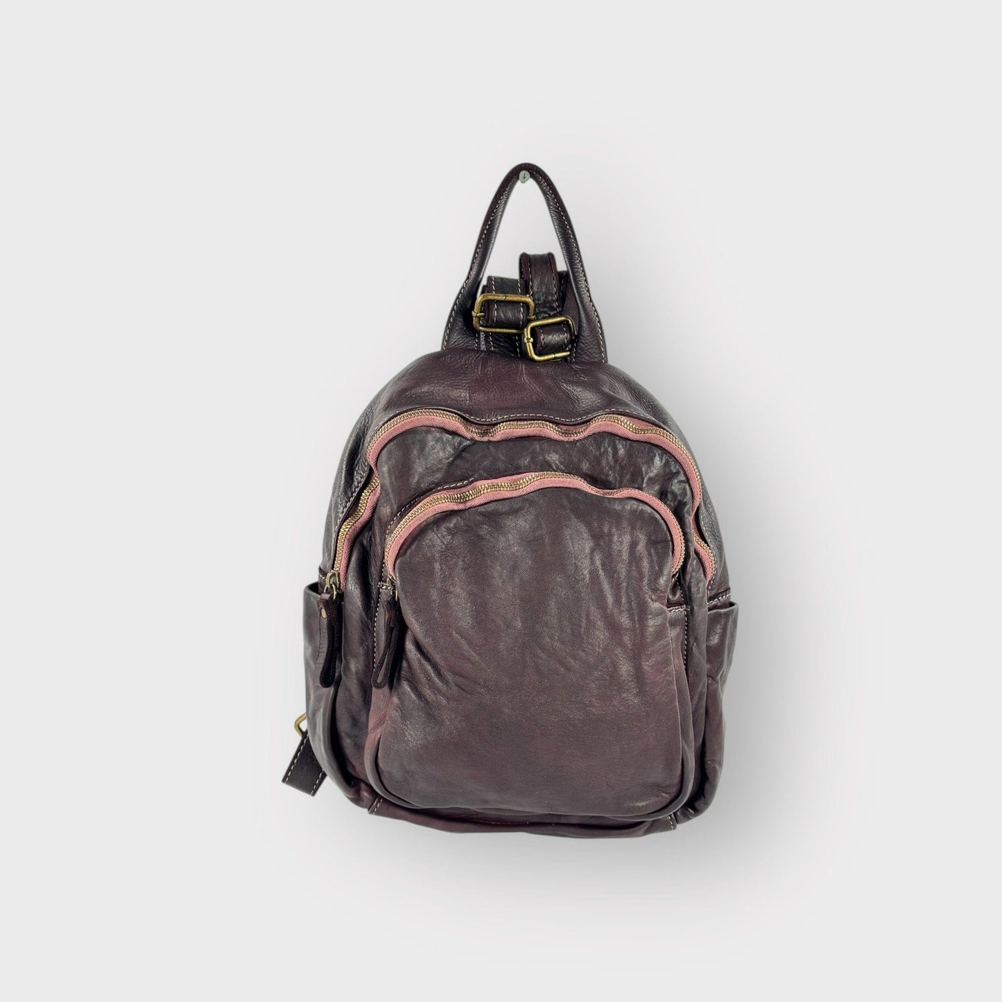 Zainetto in pelle morbida tinta in capo effetto vintage con tasca frontale -Mahzel